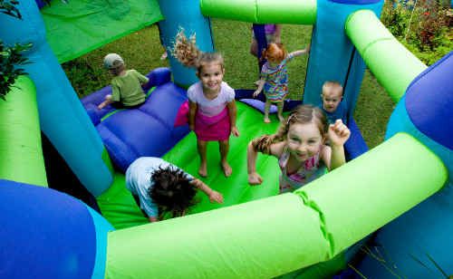 Maria Langley (in floral dress) and (pink top) have a ball during Playgroup Week. Maria Langley (in floral dress) and (pink top) have a ball during Playgroup Week.